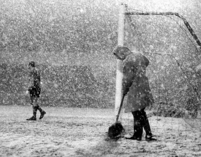 Framed Print : Arsenal v. Sheffield Wednesday. A Groundsman sweeps the line clear while Peter Framed Print : Arsenal v. Sheffield Wednesday. A Groundsman sweeps the line clear while Peter