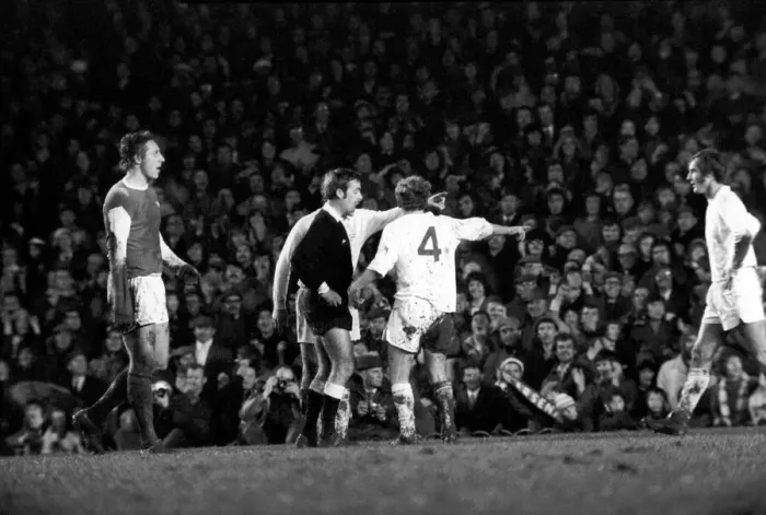 Framed Print : Arsenal vs. Leeds. Leeds players including Peter Lorimer argue with the referee after a Framed Print : Arsenal vs. Leeds. Leeds players including Peter Lorimer argue with the referee after a