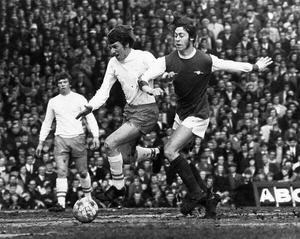 Arsenals Charlie George tries to beat a Blackpool defender. March 1971 P006191