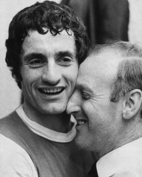 Arsenals Frank McLintock and manager Bertie Mee celebrate their League Cup win over