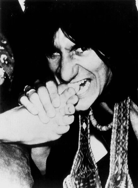 Art Photography Andy Warhol Ronnie Wood biting into a foot