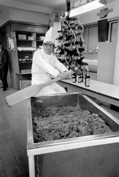 Framed Print : Arthur Askey, the famous little comedian stirred up a giant Christmas pudding today at a