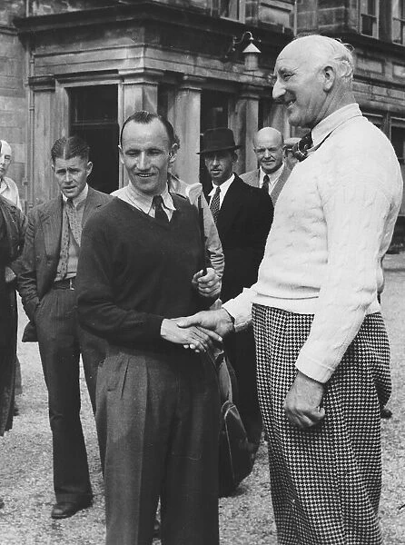 Arthur Havers golfer shaking hands with C H Ward after hole in one outside club house