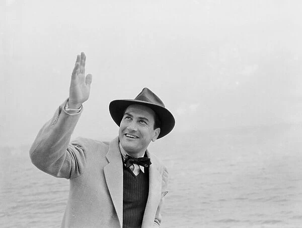 Artie Shaw, much married American dance band leader arrives at Plymouth from New York