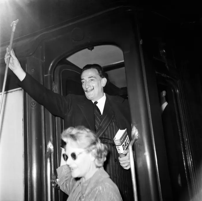 Framed Print : Artist Salvador Dali arrives in the UK, on the continental boat train to promote his Framed Print : Artist Salvador Dali arrives in the UK, on the continental boat train to promote his
