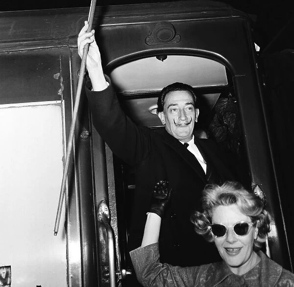 Artist Salvador Dali arrives in the UK, on the continental boat train to promote his
