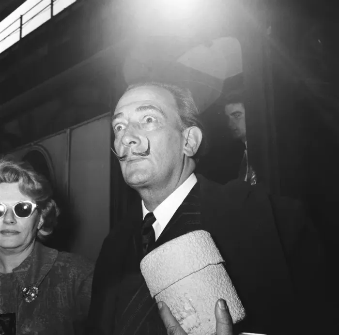 Framed Print : Artist Salvador Dali arrives in the UK, on the continental boat train to promote his Framed Print : Artist Salvador Dali arrives in the UK, on the continental boat train to promote his