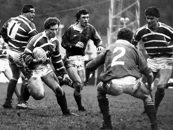 The Arwel Parry way. The Bridgend full back on the charge at Straday