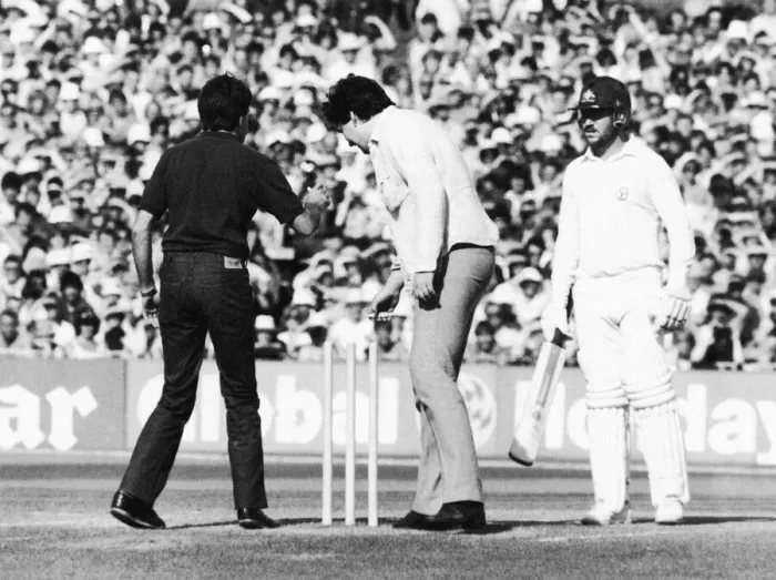 Framed Print : Ashes 1981. Pitch invasion at Old Trafford. Two fans remove the bails in front of a Framed Print : Ashes 1981. Pitch invasion at Old Trafford. Two fans remove the bails in front of a