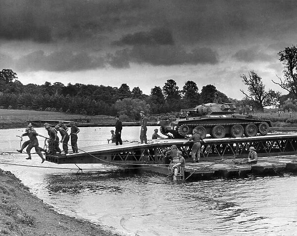 An assault river crossing by infantry and R. E. personnel somewhere in the Northern