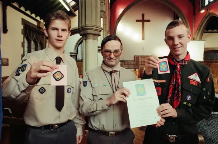 Framed Print : Assistant County Commissioner David Clark (centre) congratulates scouts Paul Barker (l Framed Print : Assistant County Commissioner David Clark (centre) congratulates scouts Paul Barker (l