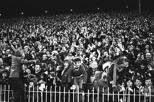 Aston Villa fans celebrate after their teams two one victory over Manchester United in