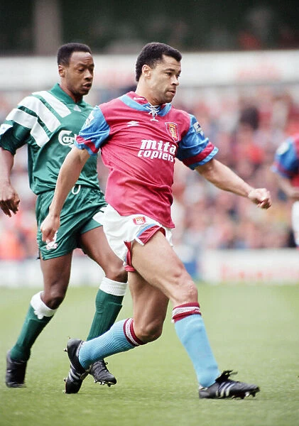 Aston Villa footballer Paul McGrath in action during their Premier league match against