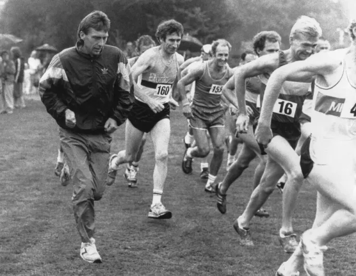 Framed Print : Athlete Dave Moorcroft joins joggers on a charity fun run in Courdon Park, Coventry