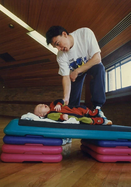 Athlete Jonathan Edwards Jonathan Edwards with ten-week-old son, Sam