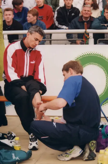 Framed Print : Athlete Jonathan Edwards Jonathan Edwards has his ankle strapped by a doctor Framed Print : Athlete Jonathan Edwards Jonathan Edwards has his ankle strapped by a doctor
