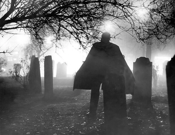 An atmospheric picture of Count Dracula in a church yard