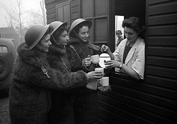 ATS on searchlight battery take a tea break during the Second World War January