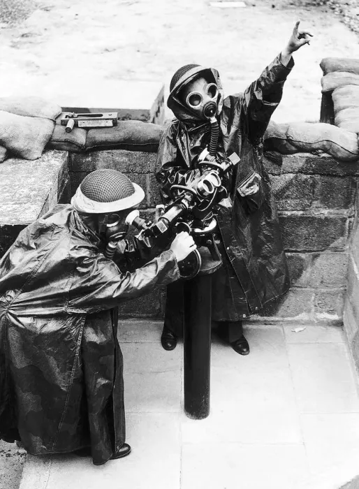Framed Print : ATS women wearing full gas equipment train on range finders at a London gun site during