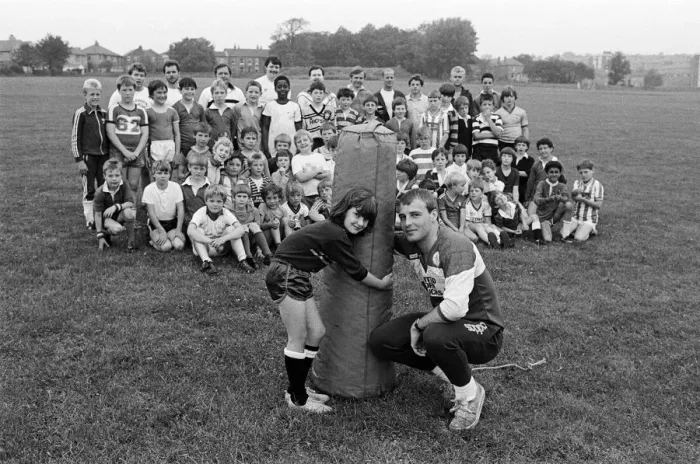 Framed Print : Attempting to make her mark in the mens game of Rugby League is nine year old Sarah