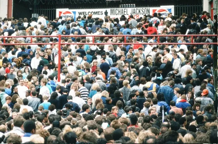 Framed Print : Audience gather outside the Wembley arena prior to the Michael Jackson concert