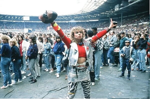 Audience gather outside the Wembley Stadium prior to the Michael Jackson concert