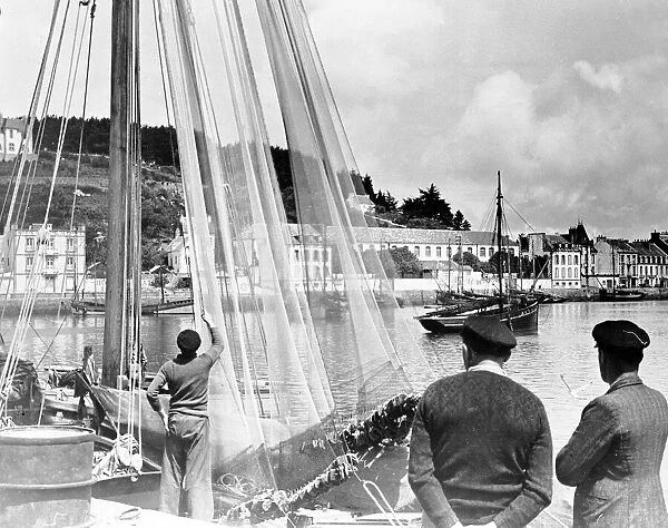 Audierne Brittany France 1938 Delicate blue fishing nets are hanging to dry