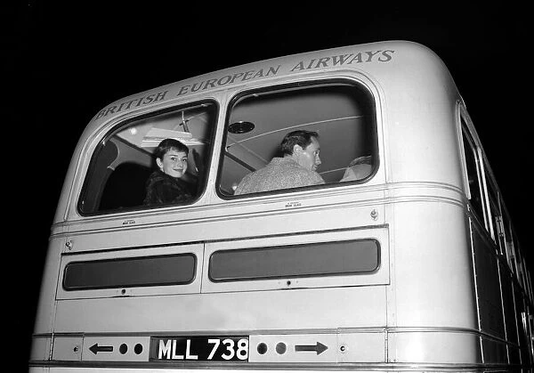 Audrey Hepburn pictured on a bus after arriving in London with her husband