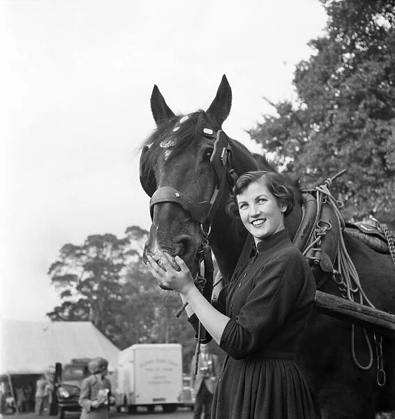 Audrey Walters, Miss Young Farmer with her horse. October 1952 C4936