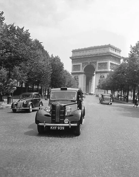A Austin FX3 taxi part of the London to Paris taxi service seen here at the Arc de