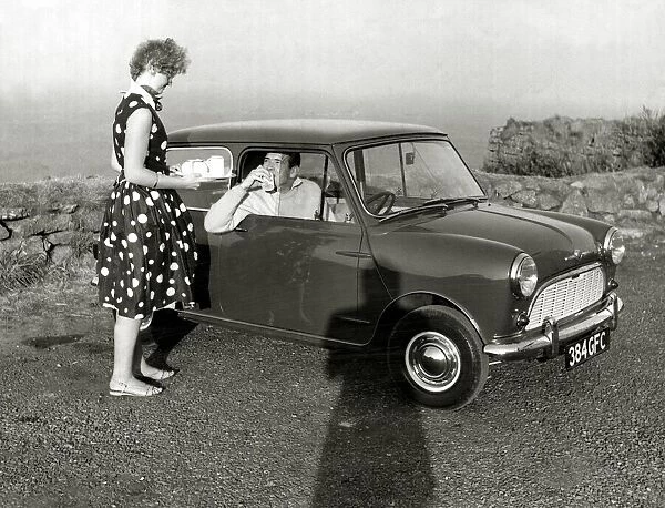 Austin Mini Car Pat Chapman test driving a Morris Mini-Minor automobile Auto