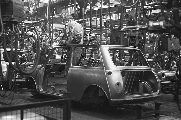 The Austin Mini production line at Longbridge. 10th March 1963 Body panels being spot