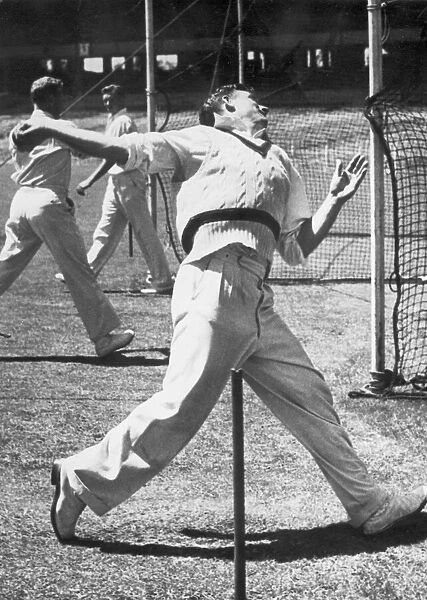 Australian fast bowler Ray Lindwall in the nets. c