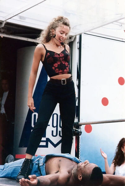 Australian pop singer Kylie Minogue performing on stage at the BBC Radio One Roadshow