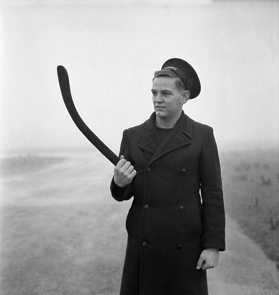 Australian Sailor Eddie Cook is a keen boomerang thrower. November 1952 C5624-002