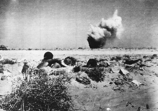 Australian troops dig in to foxholes around El Alamein. 17th July 1942