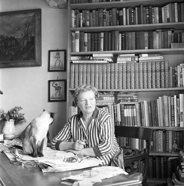 Authoress Janet Green seen here with her cat. 1960