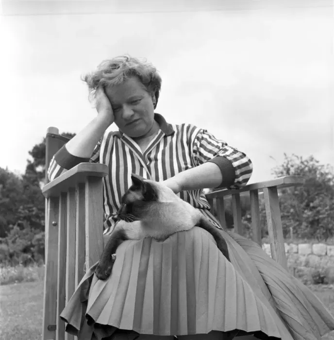 Framed Print : Authoress Janet Green seen here with her cat. 1960