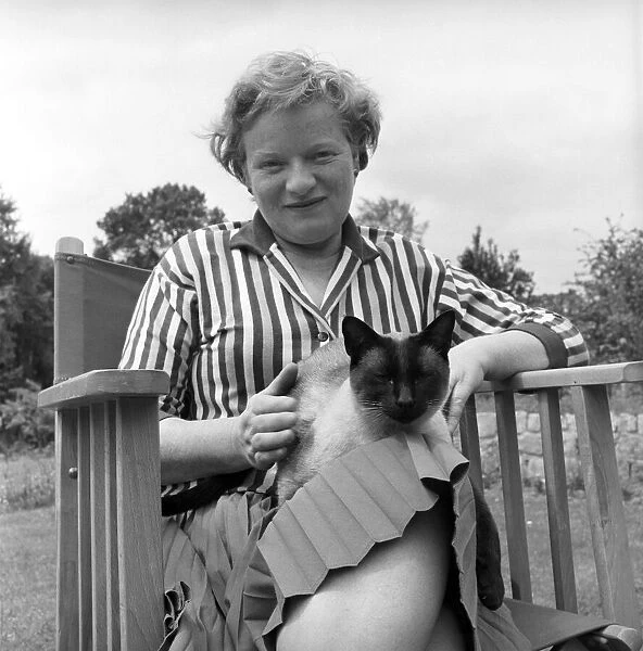 Authoress Janet Green seen here with her cat. 1960