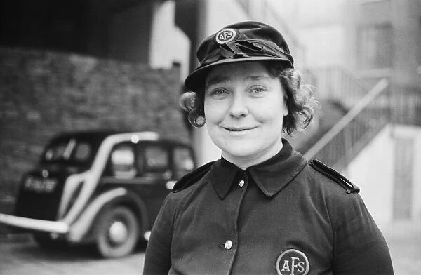 Auxiliary Fire Service (AFS) Leader Mrs E L Smith seen here after being commended for