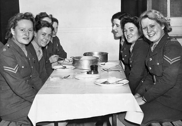 Auxiliary Territorial Service (ATS) members eating a meal in one of the most modern