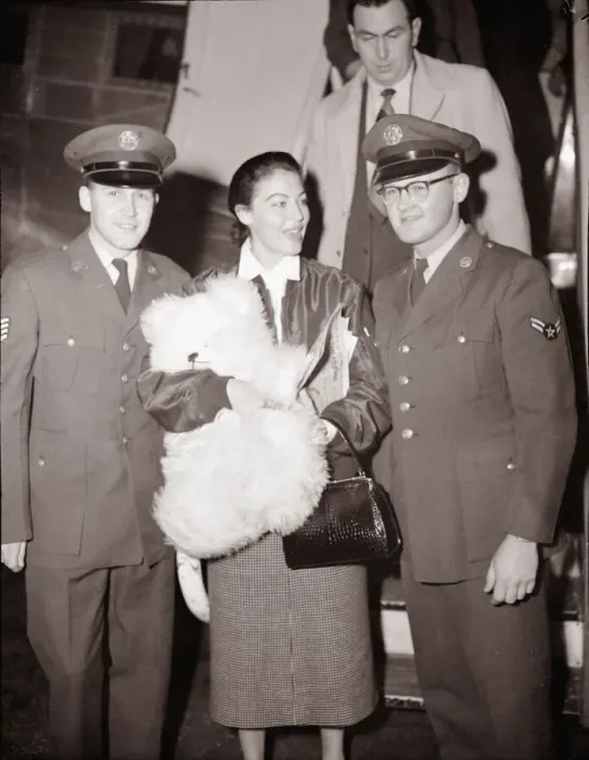 Framed Print : Ava Gardner arriving at London Airport talking to a pilot December 1954