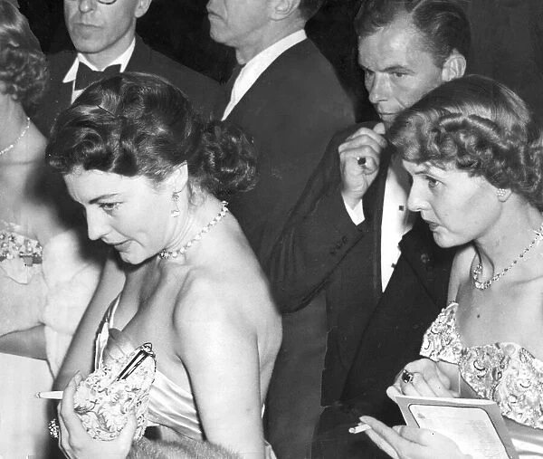 Ava Gardner and Frank Sinatra with Sheila Attenborough at theatre in London - July 1950