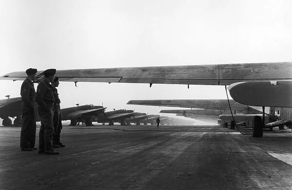 An Avenue of Hamilear gliders and RAF Halifax towing aircraft ready for take off