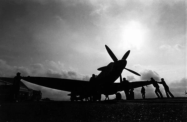 Aviation - Spitfire - The Spitfire at the entrance gates to RAF Brawdy being taken away