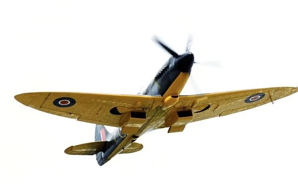 Aviation - Spitfire - A Spitfire graces the sky as she flies over Porthcawl as part of