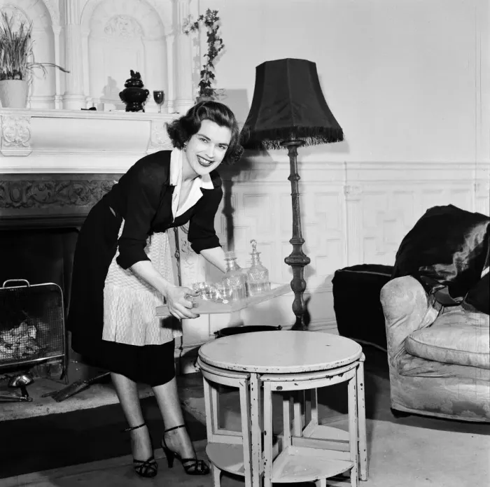 Framed Print : Avis Scott, about to start as a BBC TV Announcer, dressed as a maid which was her Framed Print : Avis Scott, about to start as a BBC TV Announcer, dressed as a maid which was her