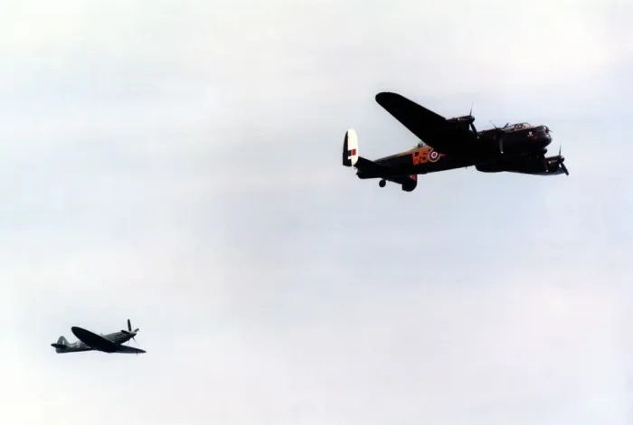 Framed Print : An Avro Lancaster bomber and Supermarine Spitfire fighter aircraft of the Battle of