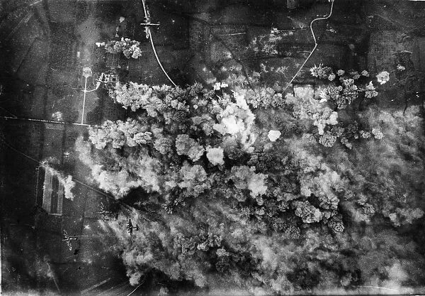 Avro Lancaster planes of RAF Bomber Command carpet bomb a road junction near Villers