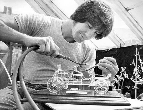 Award winning artistic glass blower Raymond Storey at work in August 1979